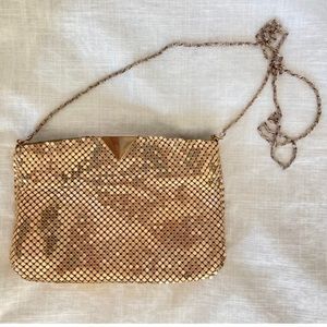 1980’s disco gold metal mesh purse.